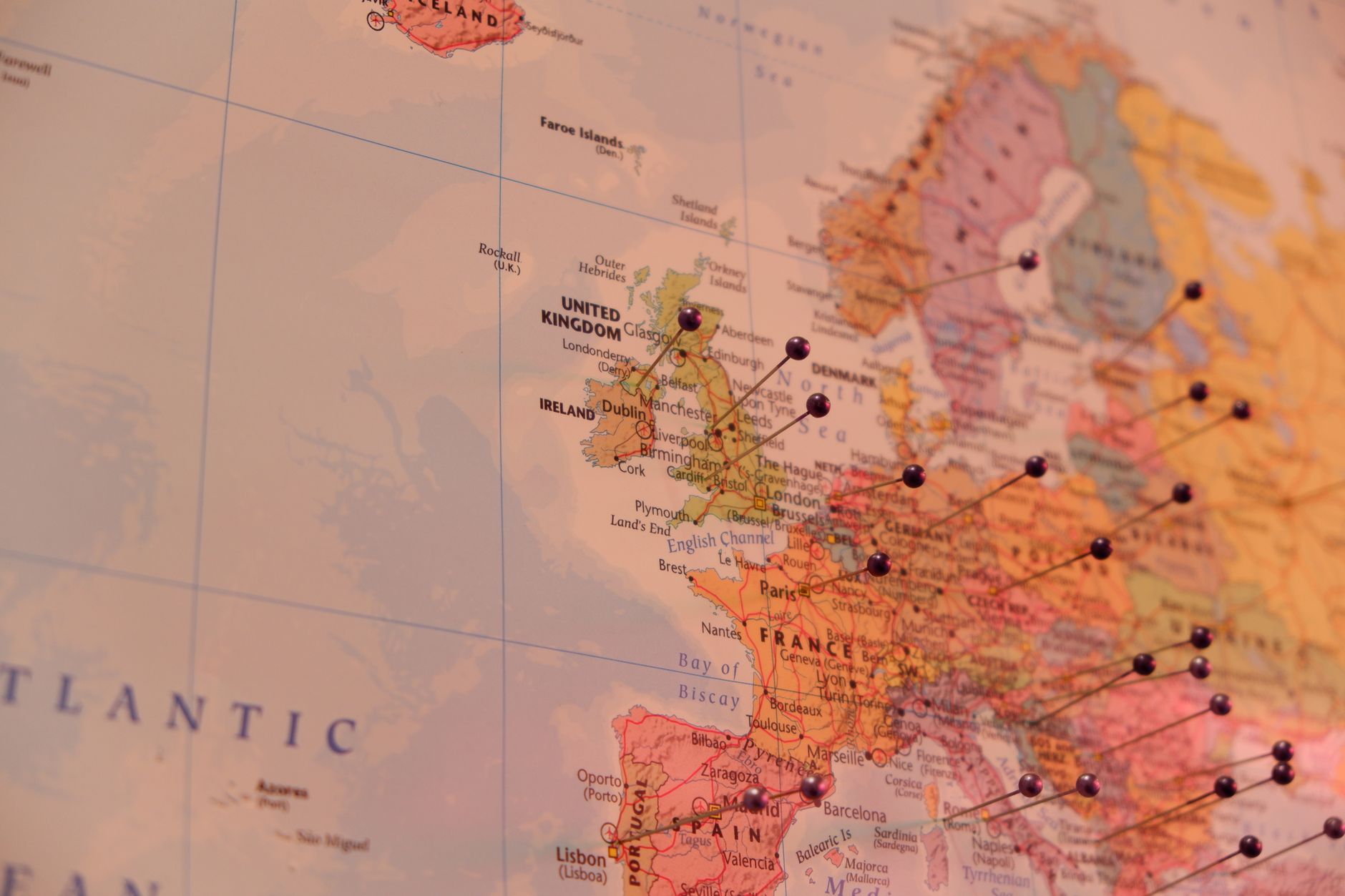 Close-up of a map of Europe with pins marking various locations